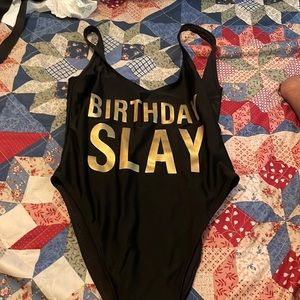 black and gold bathing suit brand new never been worn
